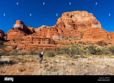 United States Arizona Sedona Senior Blonde Woman Hiking In Wilderness Stock Photo Alamy