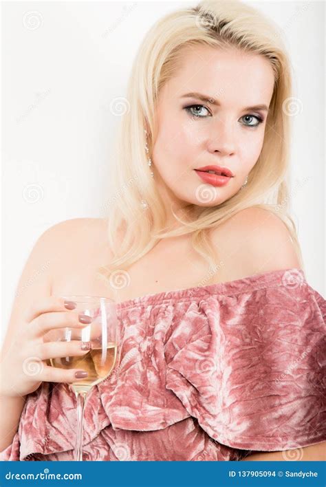 Blonde Woman Drinks Champagne On A White Background Celebration Concept Stock Photo Image Of