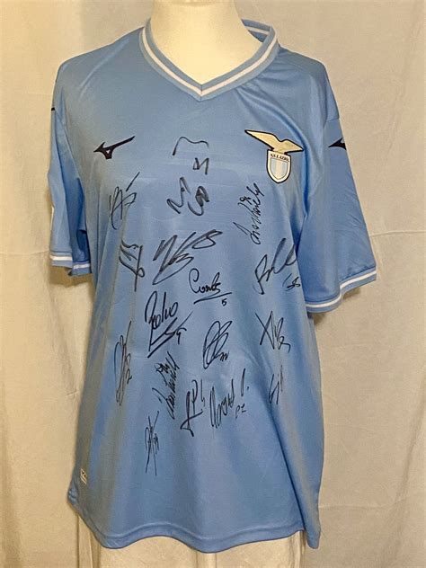 SS Lazio Team Signed Replica Home Shirt 50th Anniversary - CharityStars