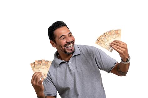 Premium Photo Man Holding Brazilian Money Smiling