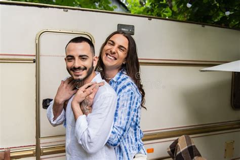 Happy Gay Couple Smiling While Hugging Stock Image Image Of Transport Handsome