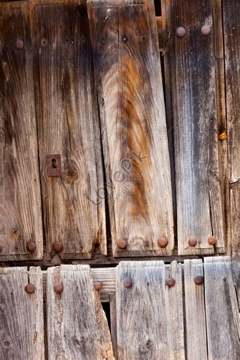 A Old Wooden Door With A Rusty Lock Picture And Hd Photos Free