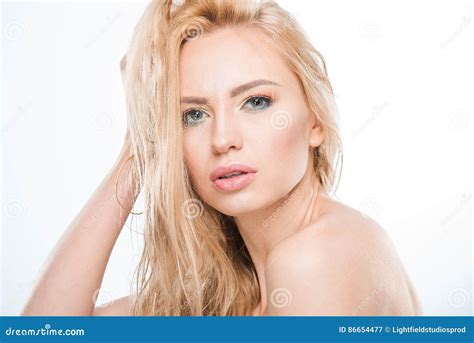 Sensual Naked Woman With Makeup And Hand On Head Looking To Camera On White Stock Image Image