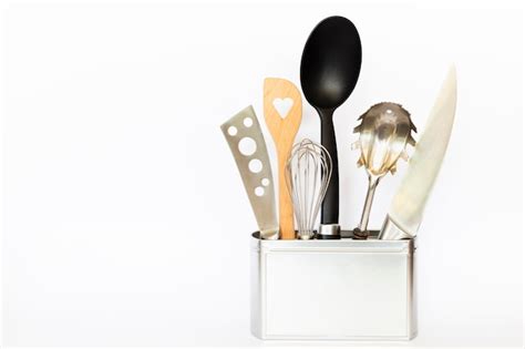 Premium Photo Assortment Of Kitchenware And Cooking Tools In A Silver