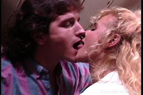 Sexy Couple Fuck On A Bed In A Hot Fuck And Suck Session From Breast Files The 1996 By Avica