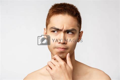 Beauty Skincare And Men Health Concept Headshot Of Serious Naked Asian Man Thinking Touch
