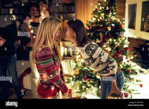 Happy Female Gay Couple Celebrating Christmas Stock Photo Alamy
