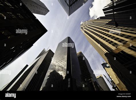 Looking Up Between The Skyscrapers In Newyork City Into The Sky