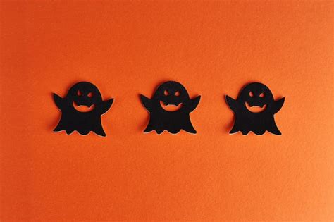 Premium Photo Halloween Decorations On Orange