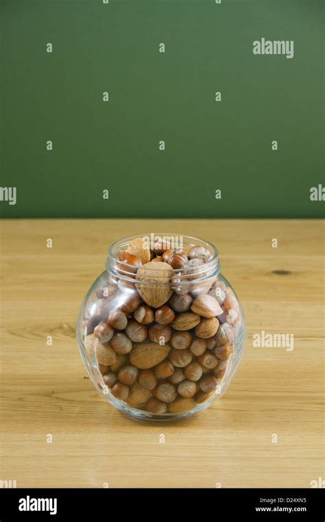 Glass Jar Of Nuts Stock Photo Alamy