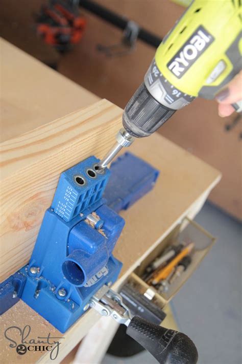 A Drill Is Being Used To Fix A Piece Of Wood With A Power Tool On It