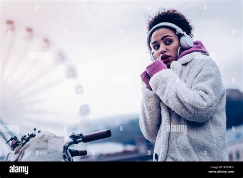 Charming Brunette Female Trying To Warm Her Up Stock Photo Alamy