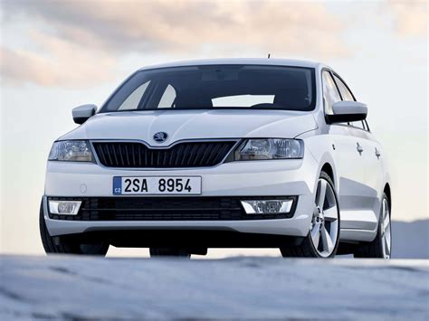 Download Sleek And Elegant Skoda Rapid In Crisp Night Cityscape ...