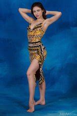 Seductive Brunette Reveals Her Gorgeous Body With Long Legs Photos