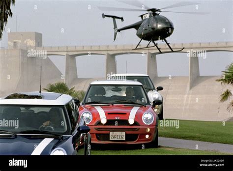 The Italian Job Helicopter Follows Mini Cars 2003 Stock Photo Alamy