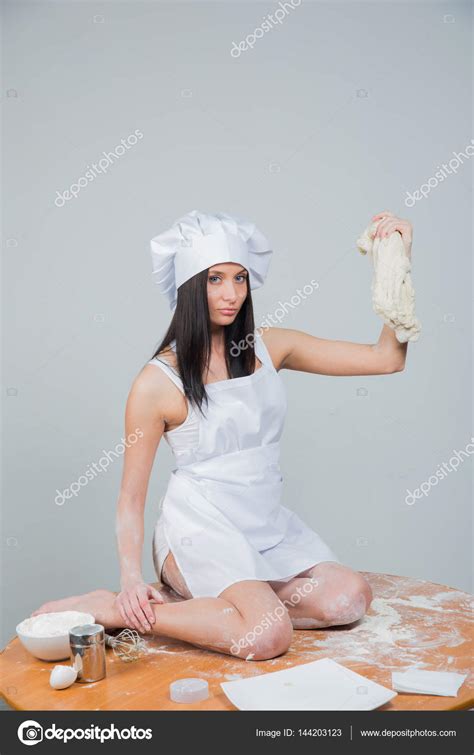 Sexy Woman In Chef Uniform Knead The Dough Stock Photo By Kopitin