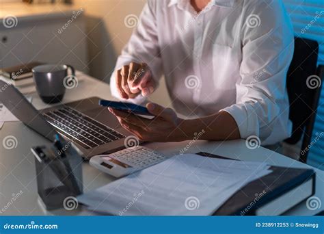 Overwork Concept The Office Man Who Sits At His Desk Holding His