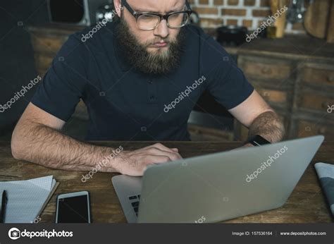 Man Working With Laptop — Stock Photo © Igorvetushko 157536164