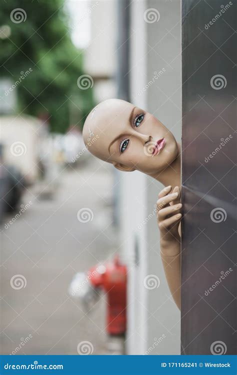 Vertical Shot Of A Naked Female Mannequin Near A Black Wall Stock Image Image Of Garment Head