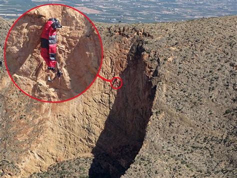 Dramatic Cliff Rescue Of Paraglider Left Dangling Metres Up In Air