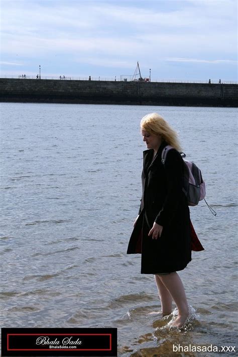 Solo Blonde Hottie Washing Her Feet In A River 15 Photos