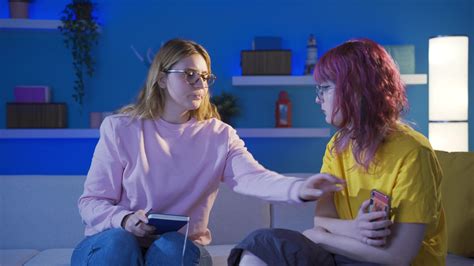 Friends hiding secrets from each other on the phone. 32425925 Stock ...