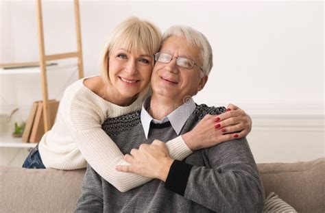 Love Lives Forever Senior Couple Hugging At Home Stock Image Image