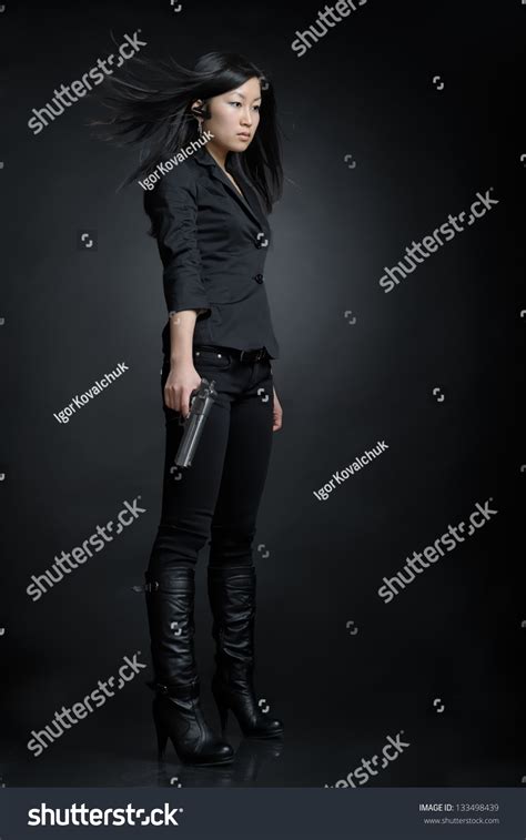 asian woman pistol stock photo  shutterstock