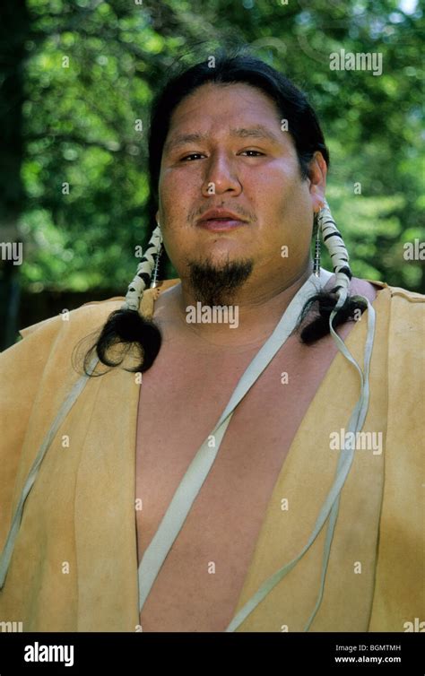 Cherokee Man Dressed In Traditional Buckskin Clothing Tells Stories Of