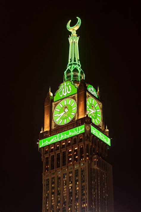 Photo Of An Illuminating Makkah Royal Clock Tower At Night Mecca