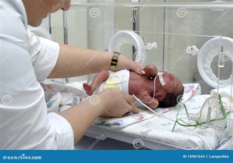 Premature Baby In Intensive Care Unit At Hospital Editorial Stock Image