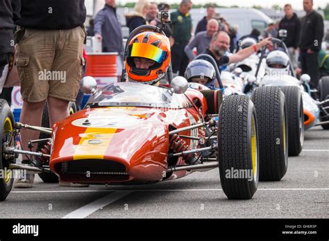 Formula Junior Racing Cars Lined Up In The Paddock At The 2016