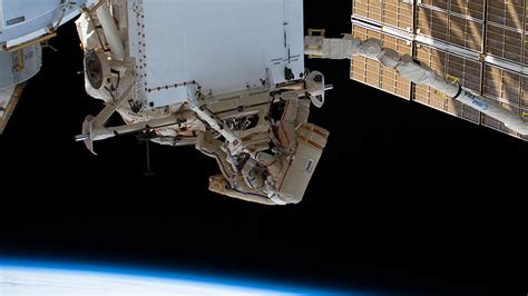 Cosmonauts Begin Spacewalk To Move Experiment Airlock Space Station