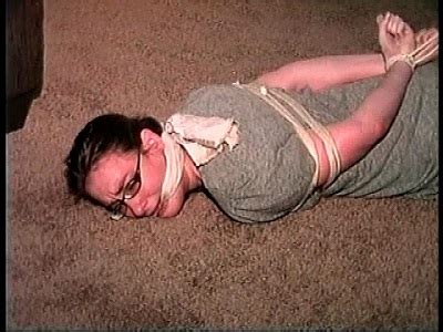 TAG Engle 19 Cleave Gagged Hogtied Short Skirt Glasses Bare Feet Wrapped In Tape Amateur