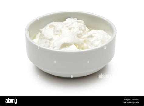 Yogurt In A Bowl Isolated On White Background Stock Photo Alamy