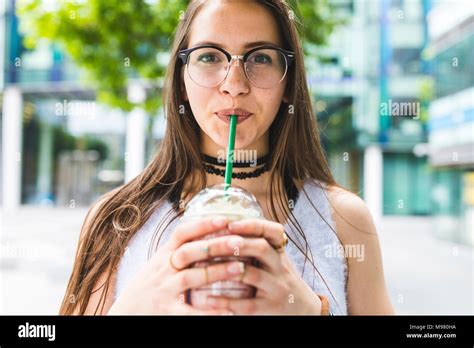 Portrait Of Teenage Girl Drinking Milkshake Stock Photo Alamy