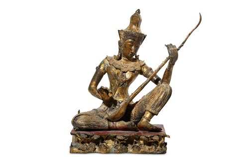 Lot 378 A Thai Gilt Metal Figure Of A Female