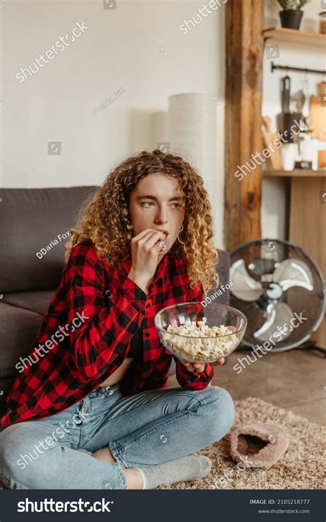 Curly Blonde Woman Watching Movie Eating Stock Photo 2185218777 Shutterstock