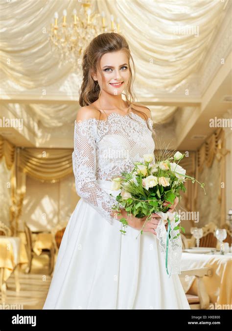 Beautiful Blonde Bride In A Wedding Dress Stock Photo Alamy