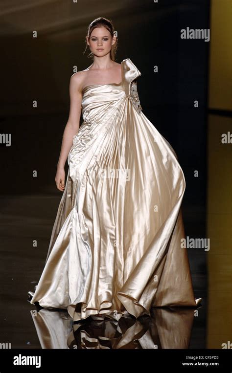 Elie Saab Paris Haute Couture Autumn Winter Brunette Female Model Wearing A Champagne Coloured