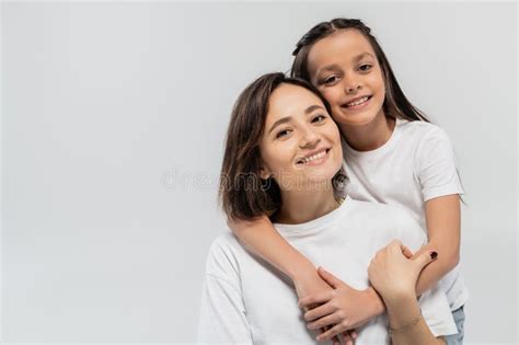 Brunette Preteen Kid Hugging Happy Mother Stock Image Image Of Emotion Holiday