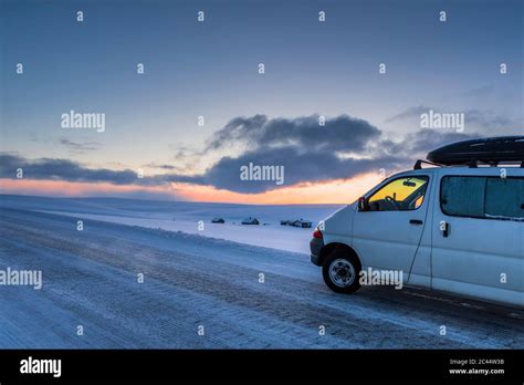 Camper Van On Country Road In Winter Tana Norway Stock Photo Alamy