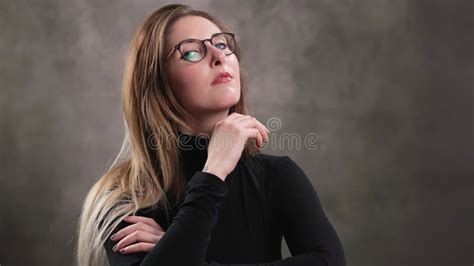 Portrait Of A Blonde Girl Posing For The Camera In A Studio Lost In Thoughts Extreme Slow