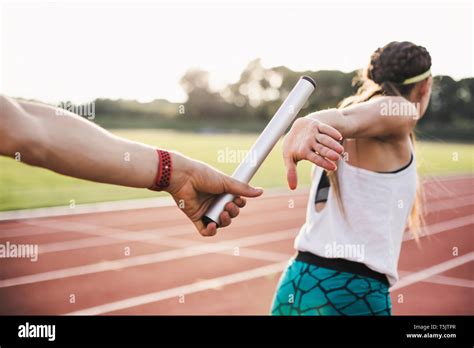 Athlete Passing Baton Hi Res Stock Photography And Images Alamy