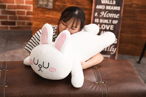 Классическая плюшевая игрушка в виде коричневого медведя и кони ...