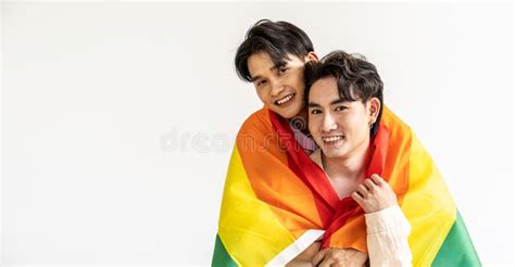 Guys Spend Time Together At Home Portrait Of Happy Asian Gay Couple Embracing And Showing Their