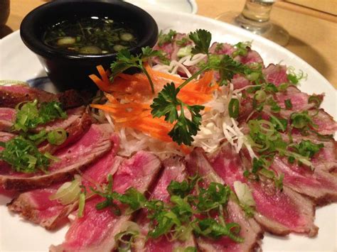 Beef Tataki. Beef seared rare, thinly sliced and served with ponzu ...