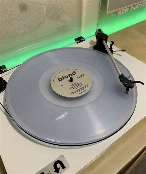 Vinyl Aesthetic Record Player On White Table