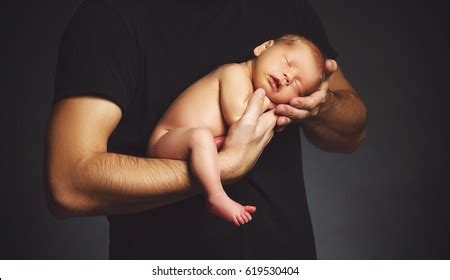 Father Holding Naked Baby His Arms Stock Photo Edit Now 2125756895