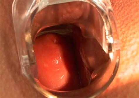 Brunette Spreads Legs Wide And Gets Pussy Lips Stretched With Vaginal Speculum